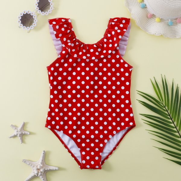 New girls\' swimsuit with ruffled edges and polka dots for children